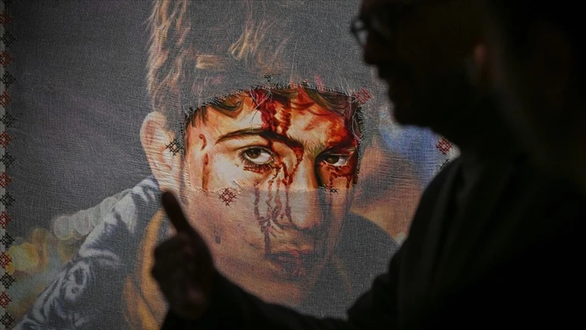 ''S&uuml;rg&uuml;ndeki Zeytin Ağacına Posterler" Sergisi Londra'da a&ccedil;ıldı