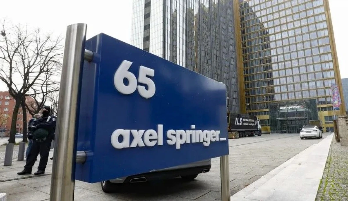 UK clears way for German media group Axel Springer&rsquo;s planned purchase of Telegraph Media Group